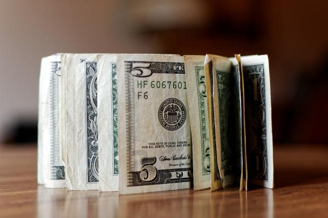 stack of dollar bills
