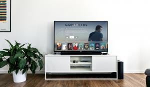 Image: television in living room with "Gone Girl" on screen. Topic: Energy Efficient TV: Green and Climate-Friendly Televisions 