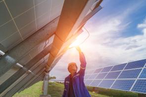 Technician in a solar field